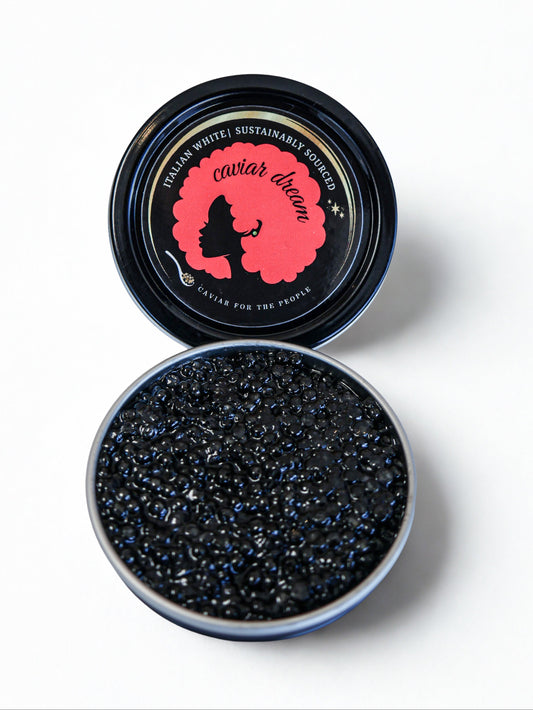 Open container of Italian White caviar with a branded lid on a white background